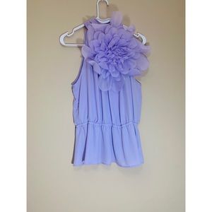 Flower embellished top